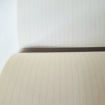 SHOOT lined journal with leather closure
